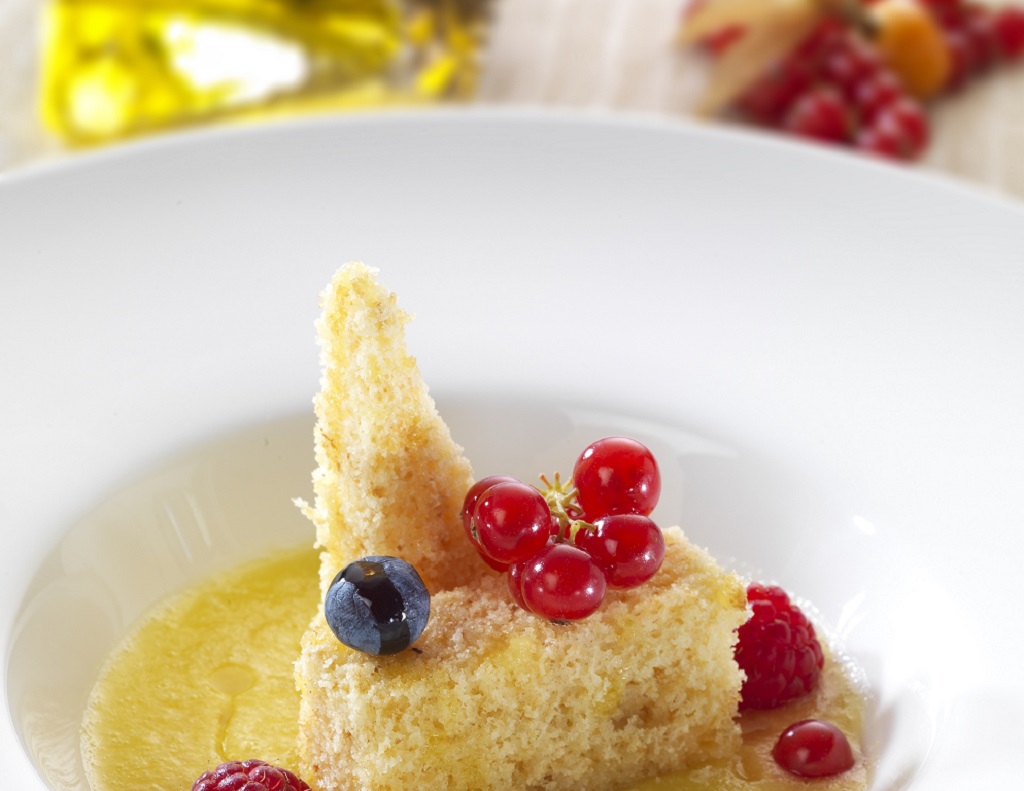 Pineapple coulis, chocolate cake, hot berries - Olive Oils from Spain
