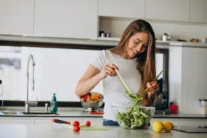woman making a salad